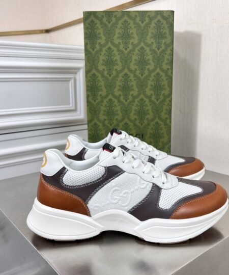 Gucci Men’s GG Embossed Rhyton Sneakers Brown For Men 721750