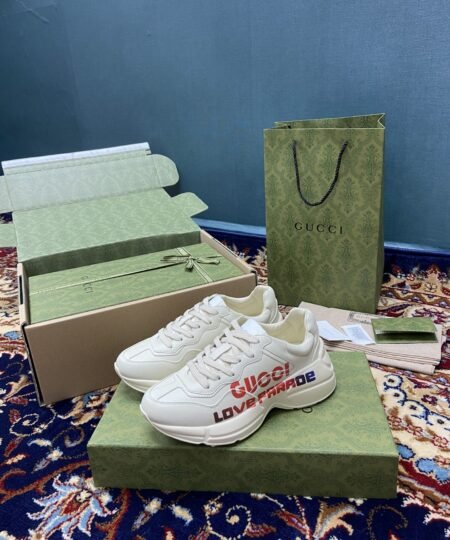 Gucci Women’s Rhyton Sneakers With Gucci Love Parade Red White Ivory For Women 524990‎